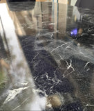 TABLE A MANGER 6 PLACES 80X140 MÉTALIQUE OVAL NOIR LOTUS